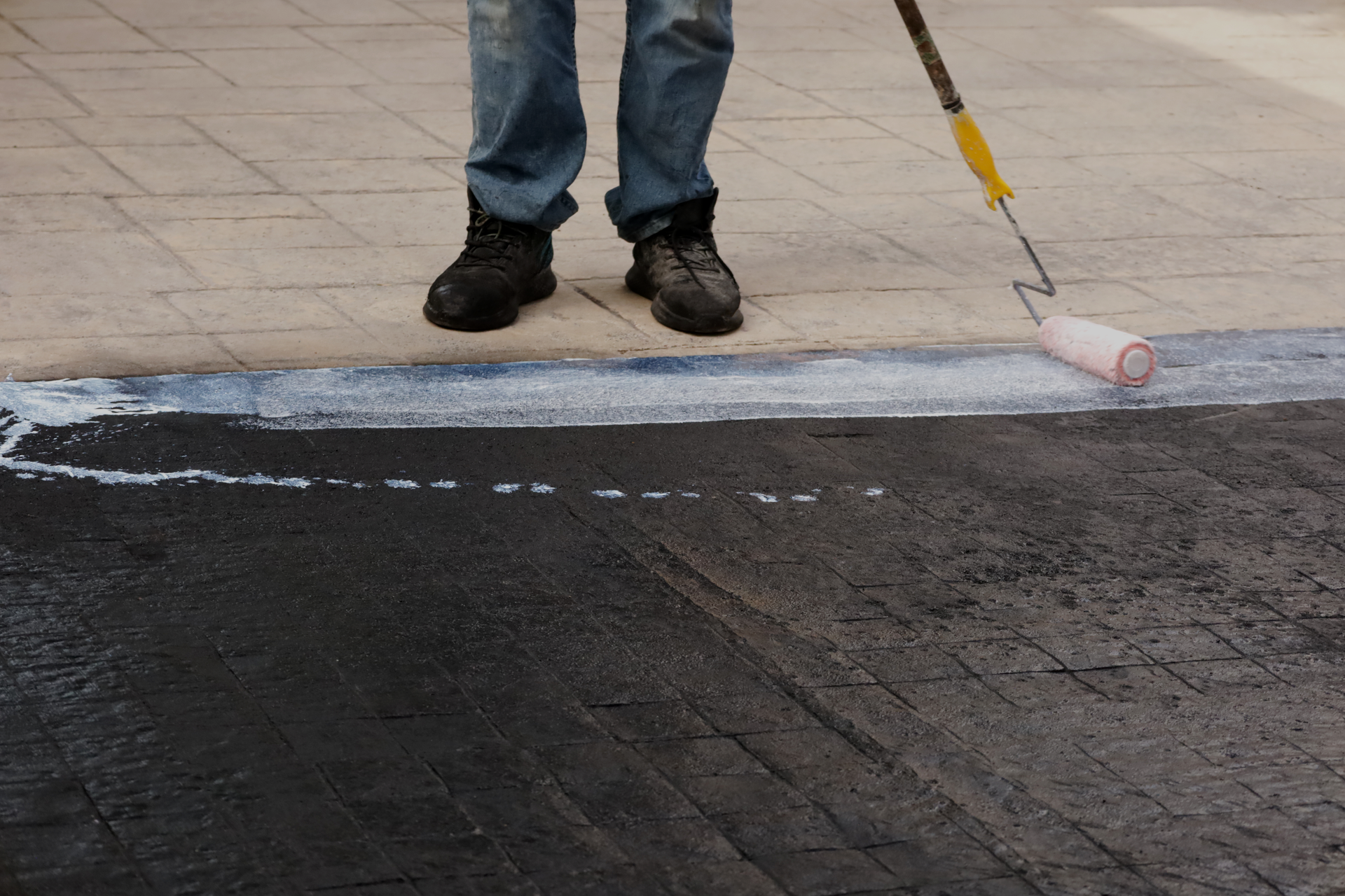 Sealer application over concrete flooring